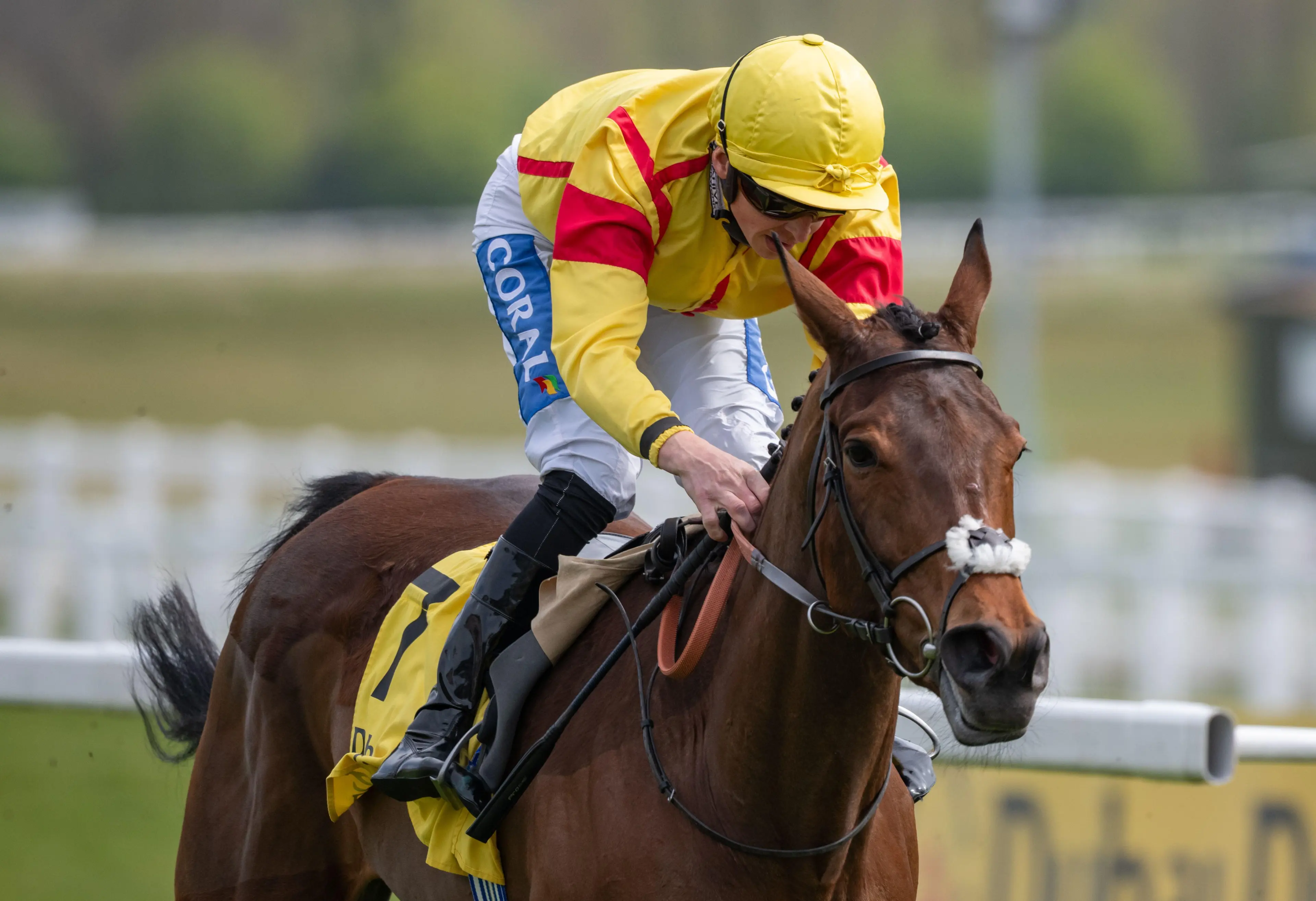 Newbury, United Kingdom. Saturday 12th April 2025. Divina Grace and David Probert win the Dubai Duty Free Finest Surprise Stakes ( Class 1 ) ( Registered as the John Porter Stakes ) ( Group 3 ) for trainer Andrew Balding and owners Top Hat & Tails